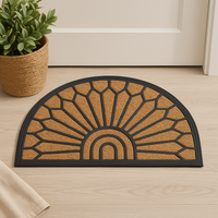 Stylish crescent-shaped doormat made of natural coir for entryways